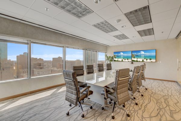 A large conference room with chairs and tables.